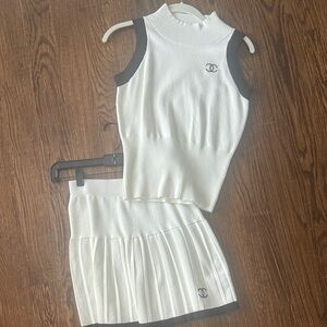 Tennis - White Knit Sleeveless Top and Pleated Skirt with Black Trim